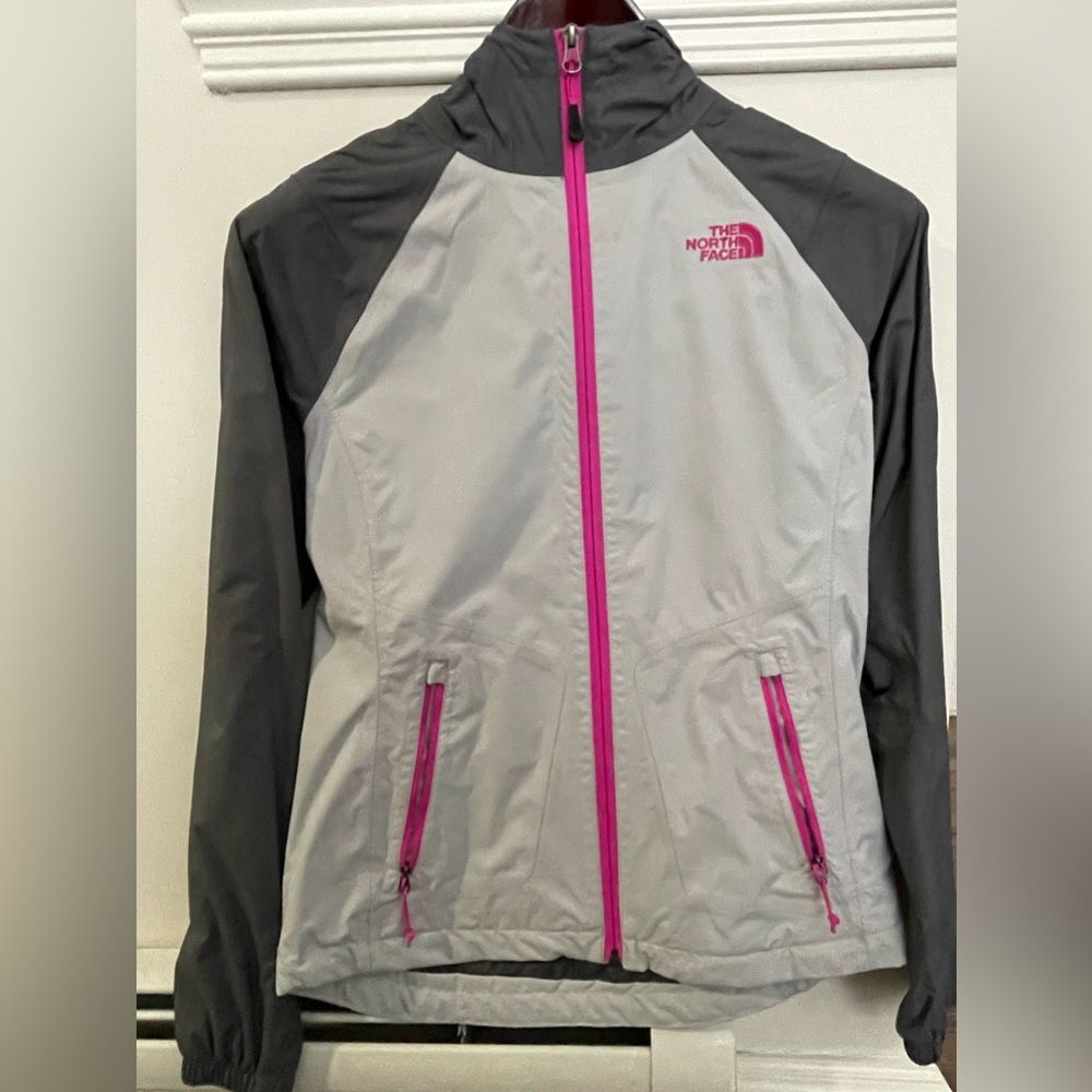 The North Face light weight waterproof jacket New without tags. Never worn